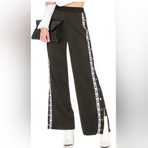 EUC Track Pants With Side Snaps, Black, White Stripe With LPA Logo, Size Medium.